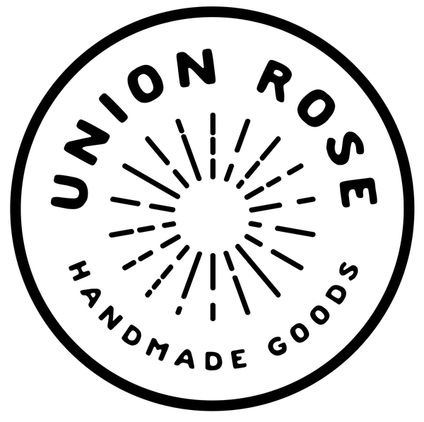 The Union Rose logo in black on a white background 